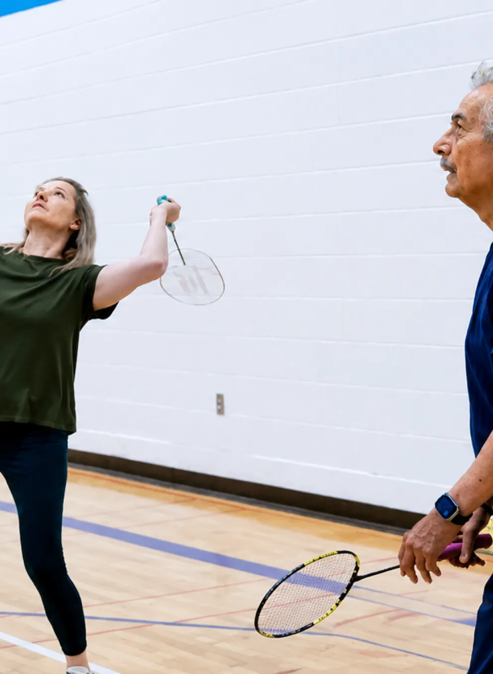 2 players playing badminton