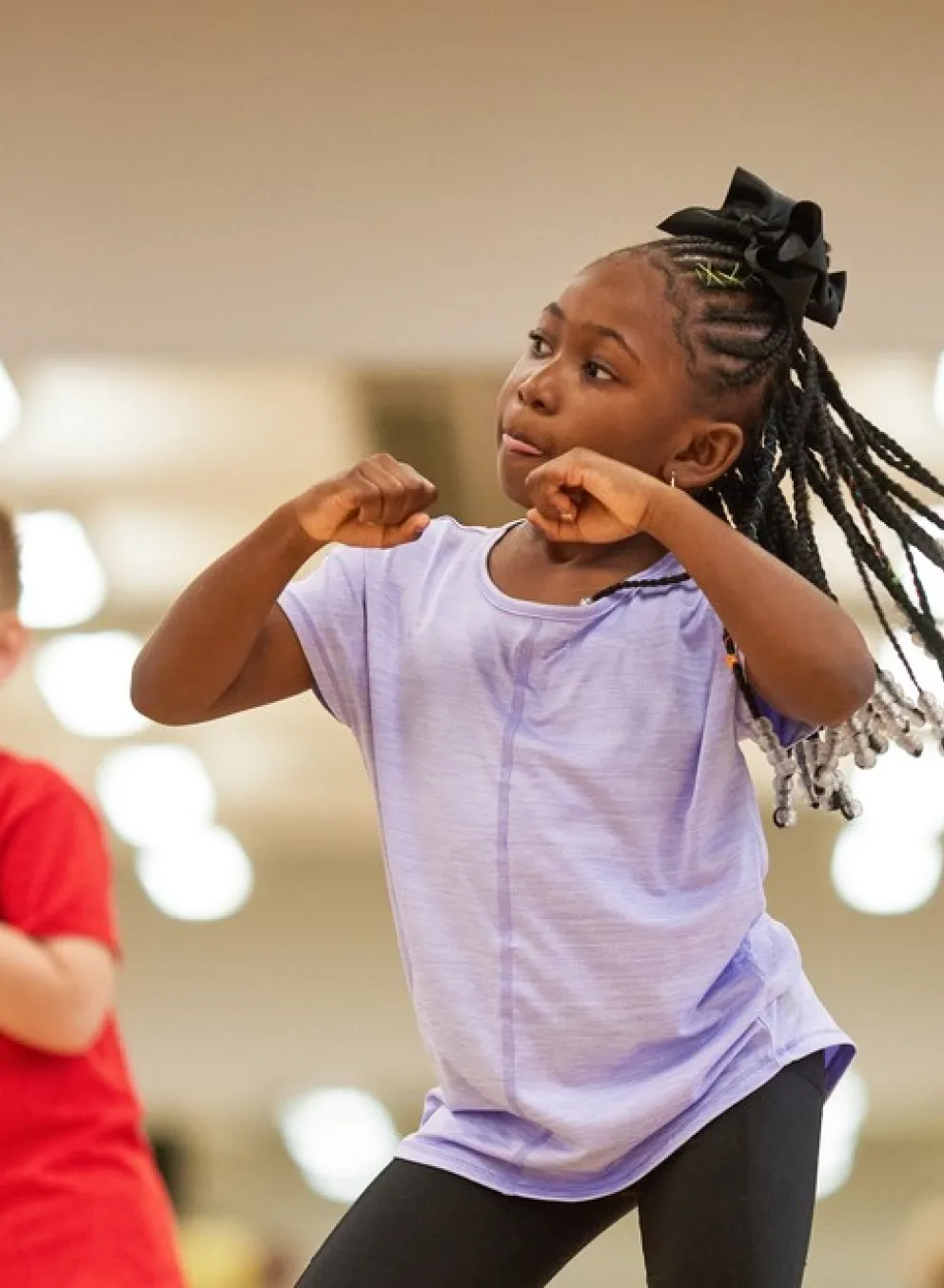 Group of 5 children dancing