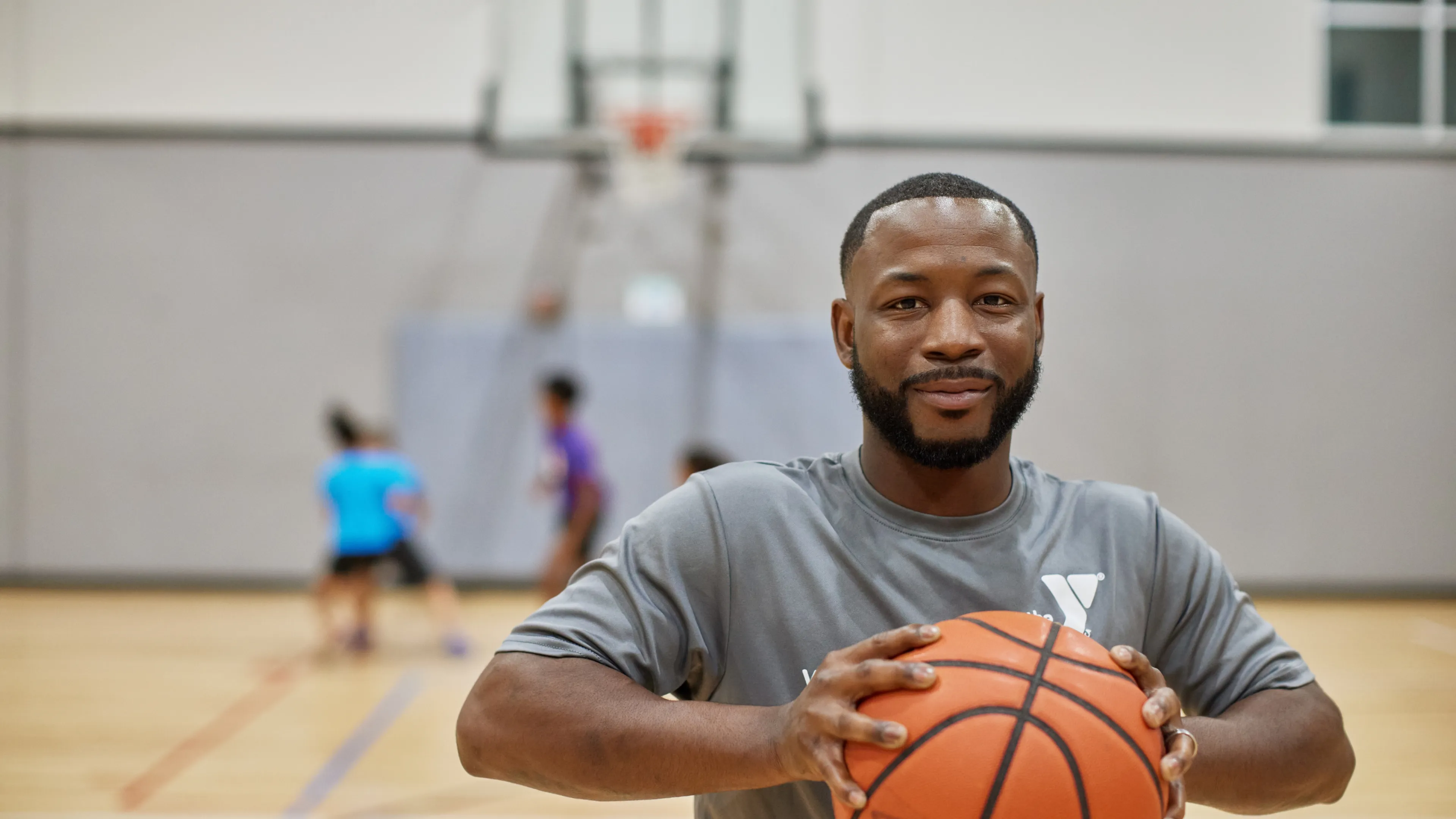Basketball Player holding basketball