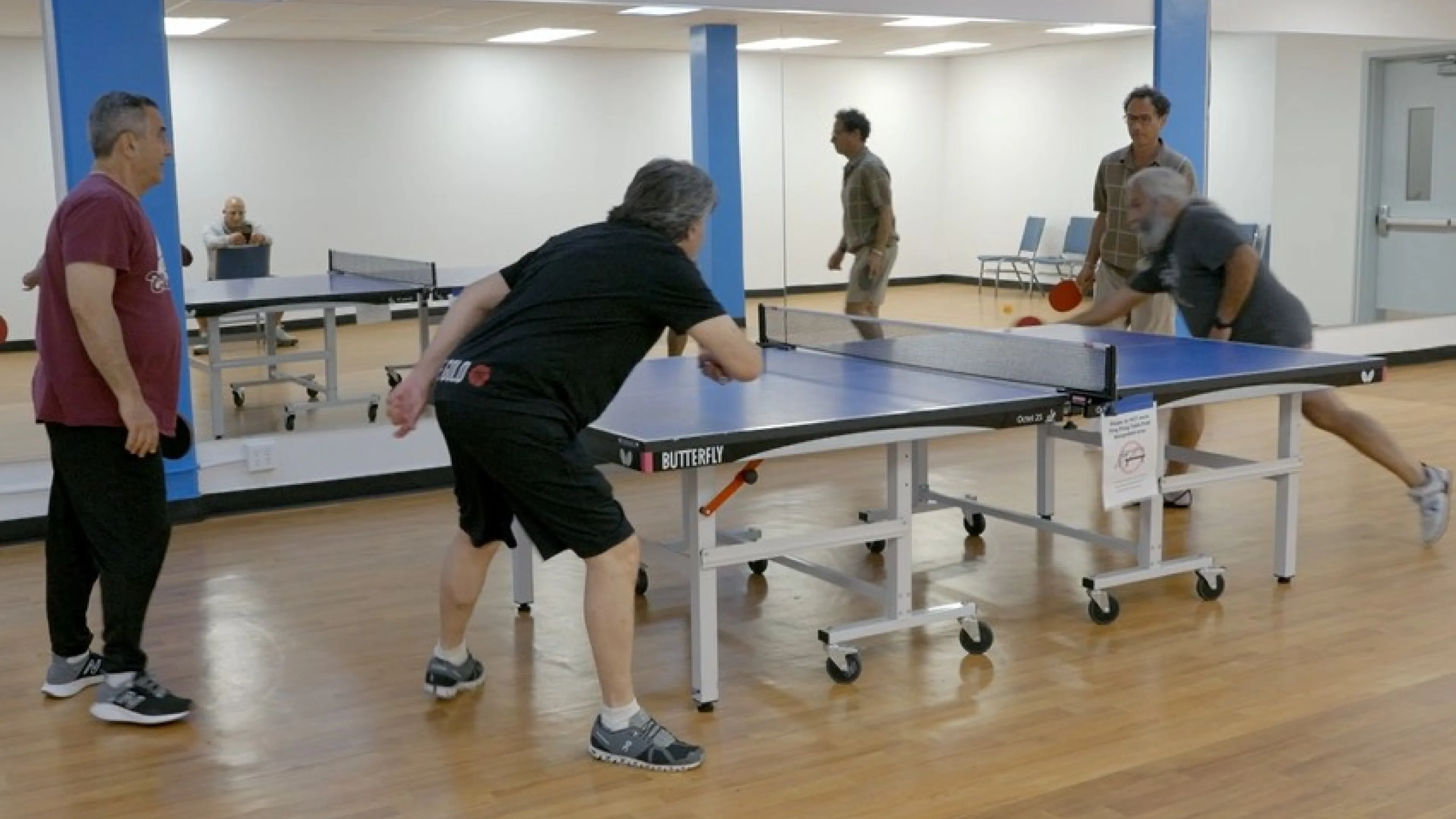 4 table tennis players