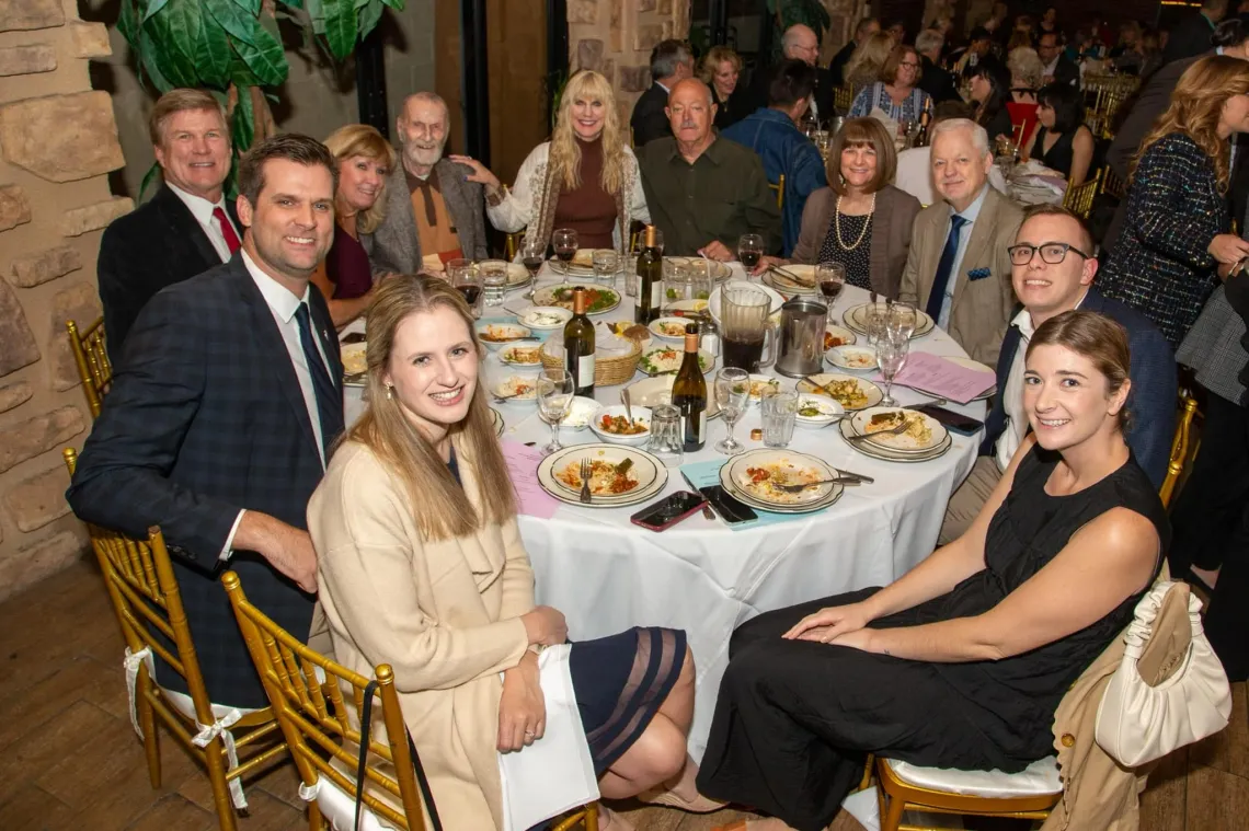 group of attendees at table attending the Annual Gala dinner