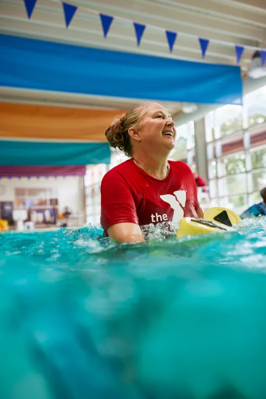Senior swimmer in water aerobics