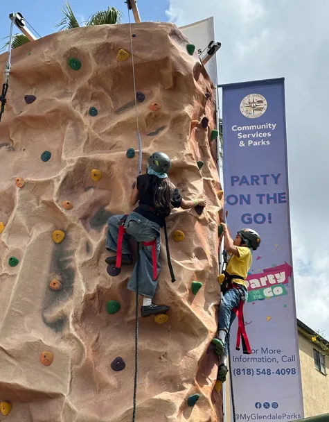Kids climbing rockwall